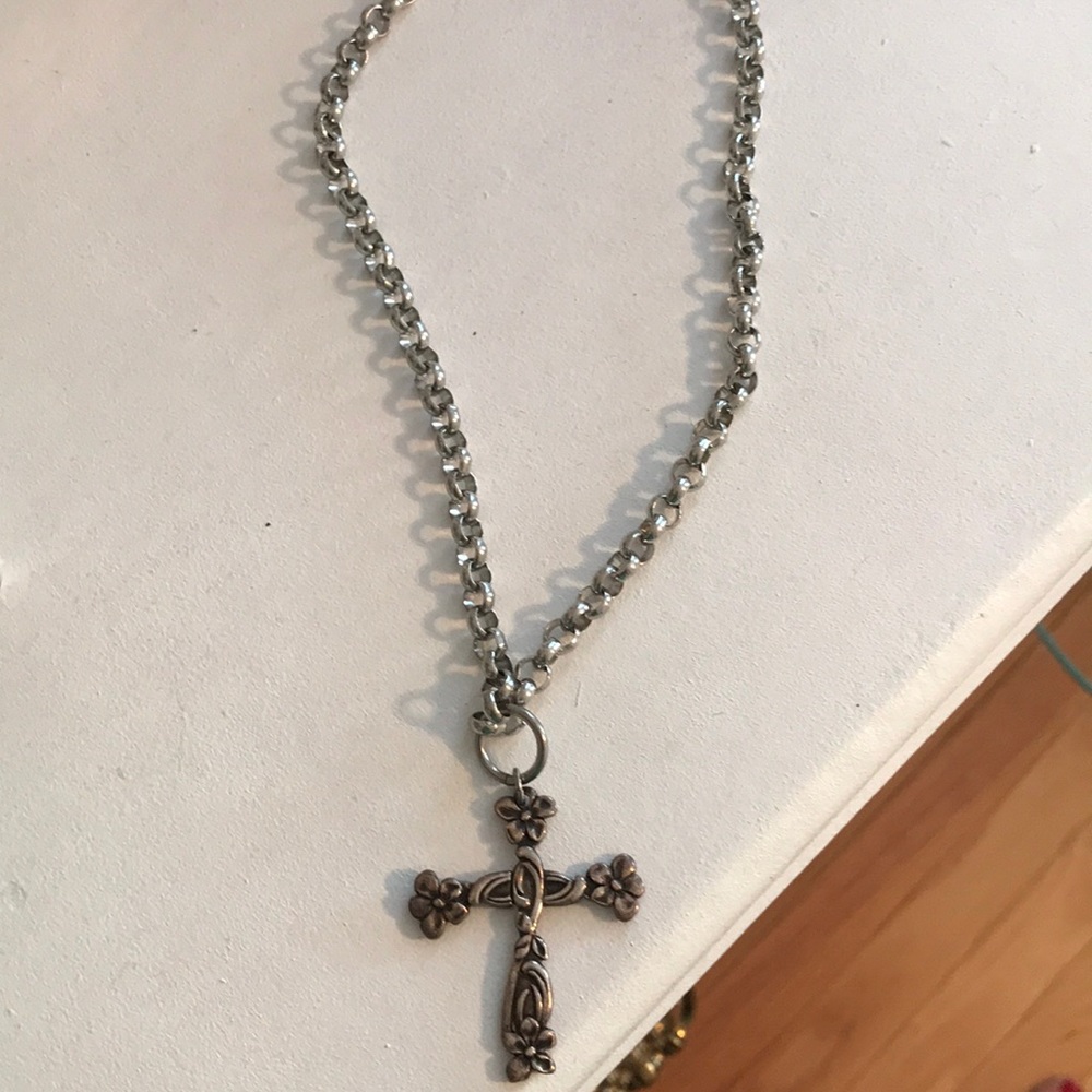 Silver cross necklace.